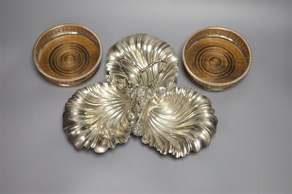 A pair of Sheffield silver plated wine coasters and plated hors doevres